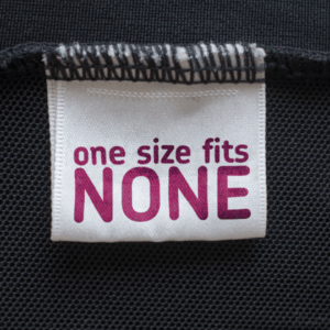 One size fits none label symbolizing personalized approach to IV therapy and weight loss injections