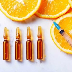 Vitamin C injection ampoules with oranges representing immunity boost vitamin shots in National City